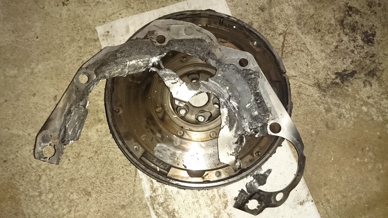 The adapter plate between the engine and the transmission
